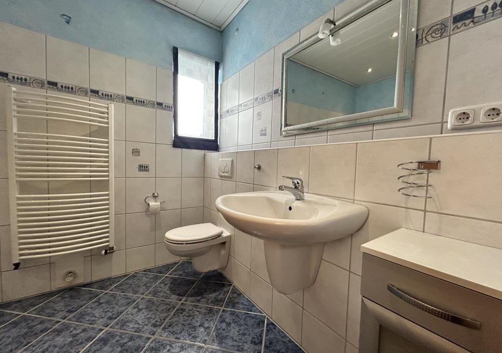Badezimmer mit Fußbodenheizung